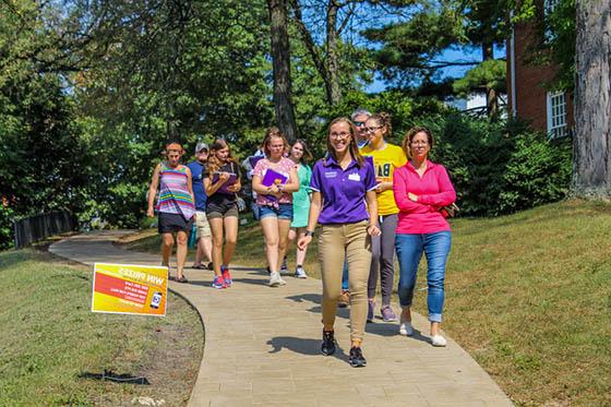 Photo of a Chatham University student ambassador leading a tour on Shadyside Campus